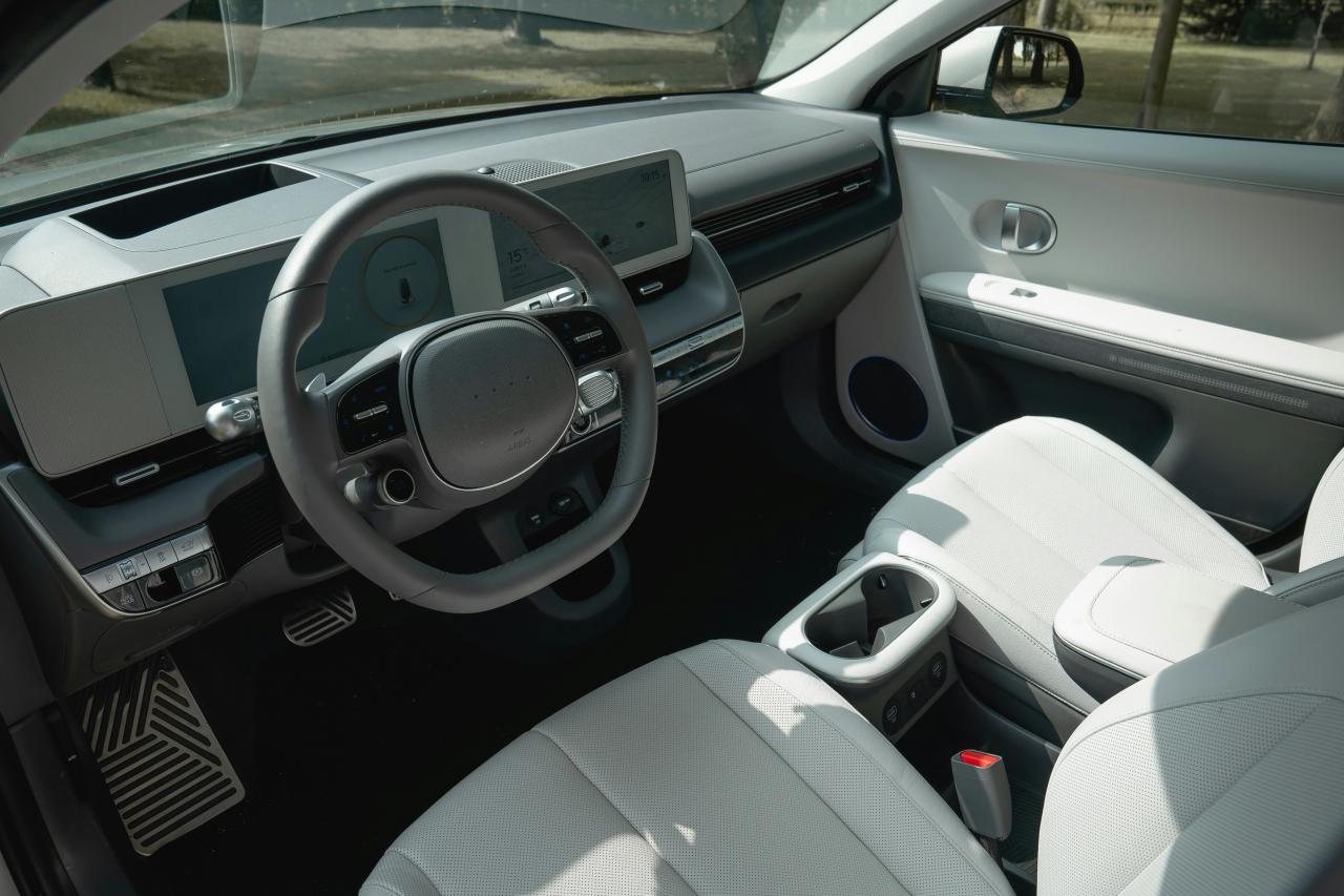 Modern car interior with digital dashboard and comfortable seats