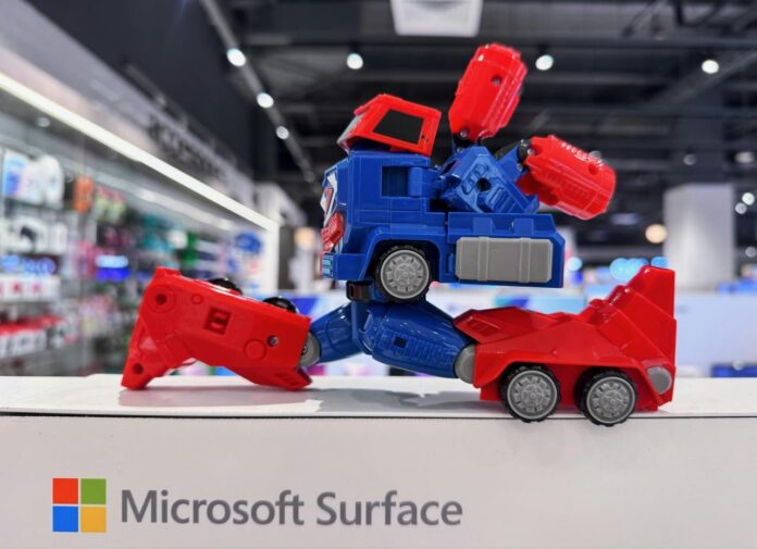 Toy robot on a microsoft surface display in a store